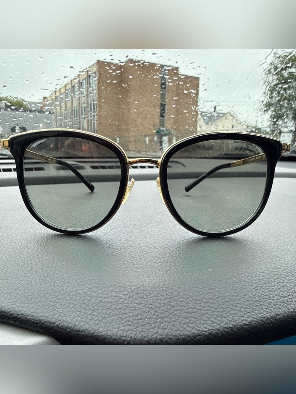Michael Kors Black and Gold Round Womenโs Sunglasses